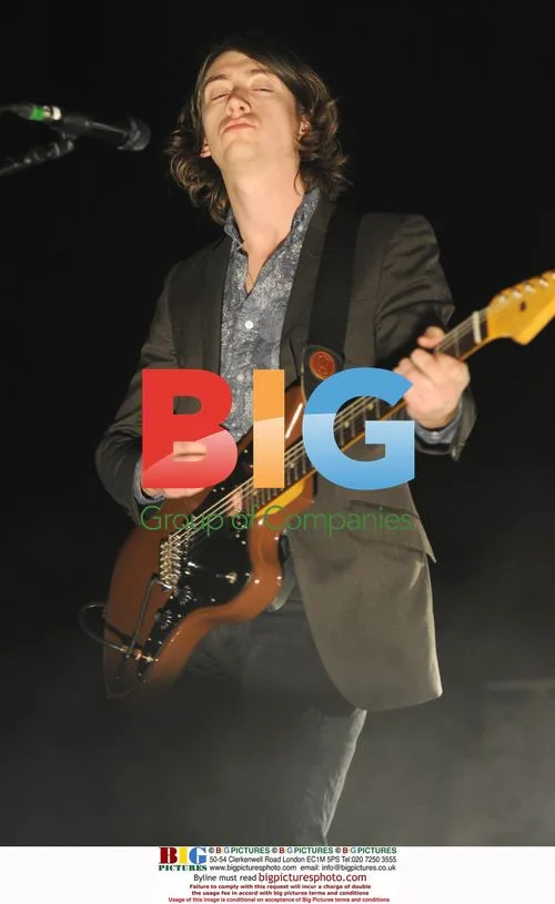 Alex Turner of Arctic Monkeys Performs