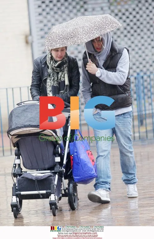 Gareth Gates and Wife Brave the Rain
