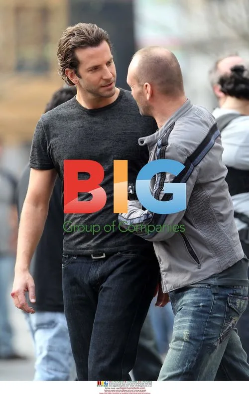 Bradley Cooper and Andrew Howard on film set