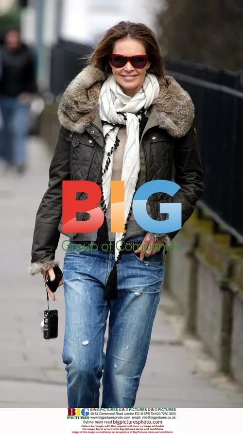Elle MacPherson Spotted With Mystery Man
