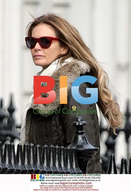 Elle MacPherson spotted with mystery man