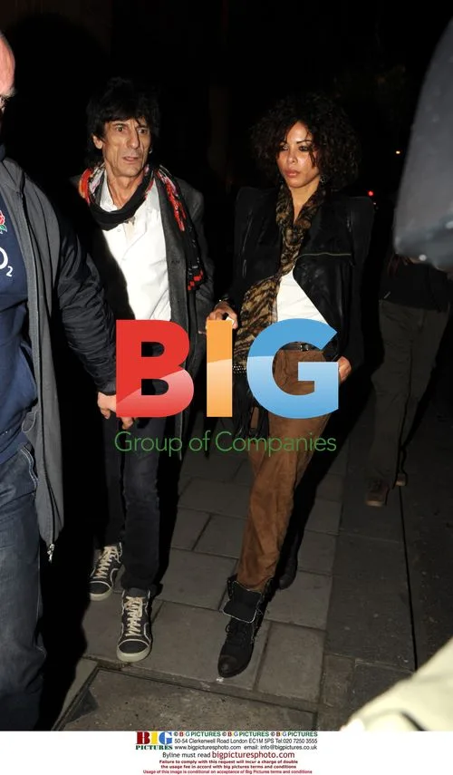 Ronnie Wood and girlfriend leaving restaurant