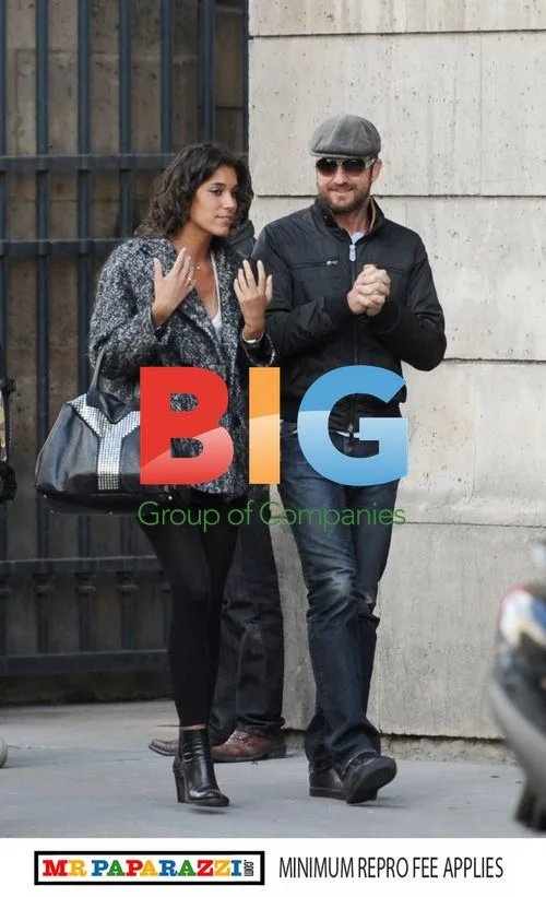 Gerard Butler spotted with Laurie Cholewa in Paris