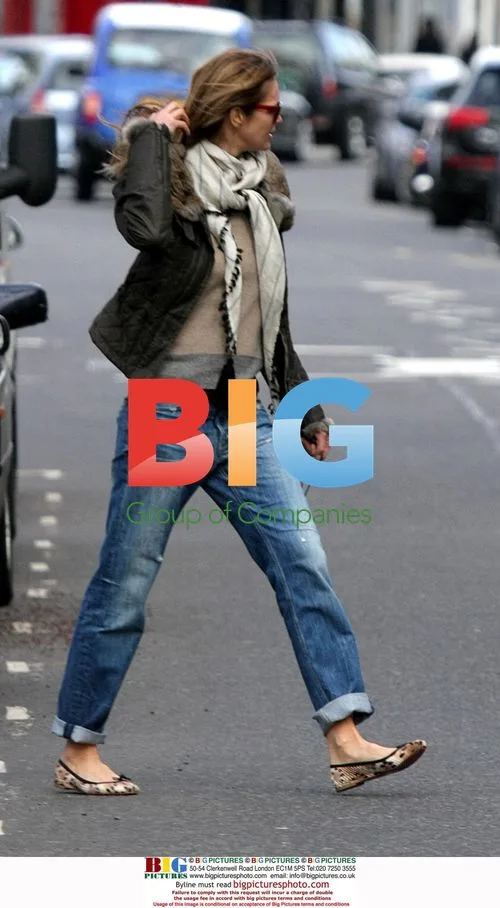 Elle MacPherson Spotted With Mystery Man in London