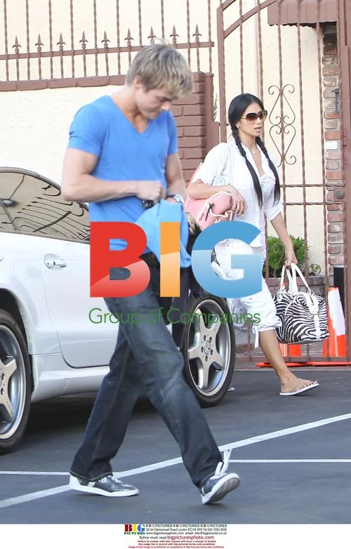 Derek Hough and Nicole Scherzinger exit DWTS studio