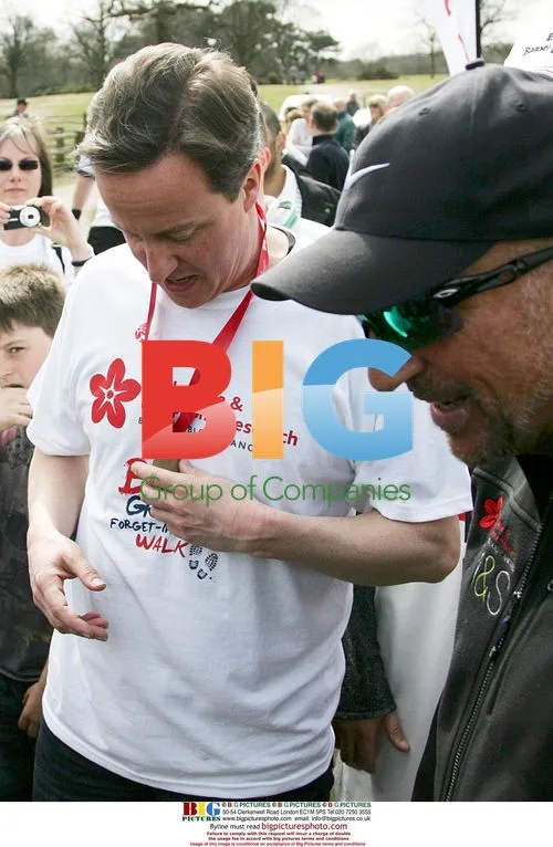 David Cameron and Ian Botham in charity walk