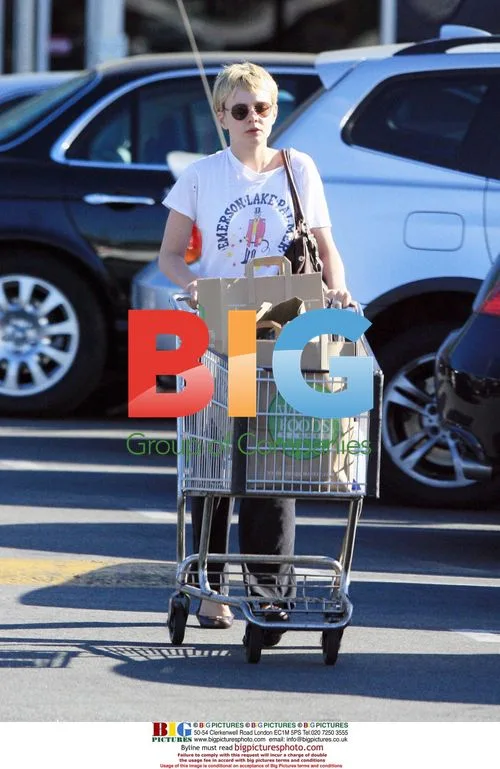 Carey Mulligan Works Out in Boyfriend's Shirt