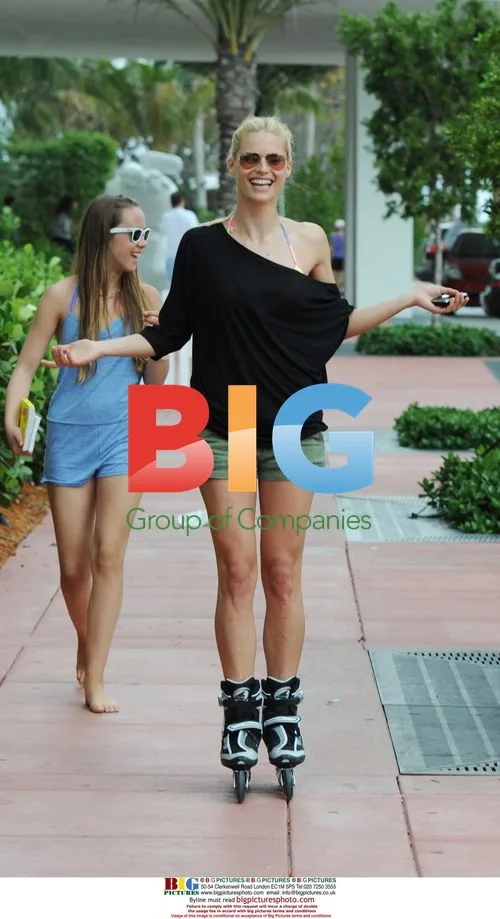 Michelle Hunziker Roller Blading on Miami Beach