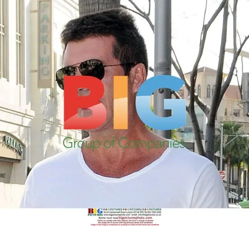 Simon Cowell and Mezhgan Hussainy in Beverly Hills
