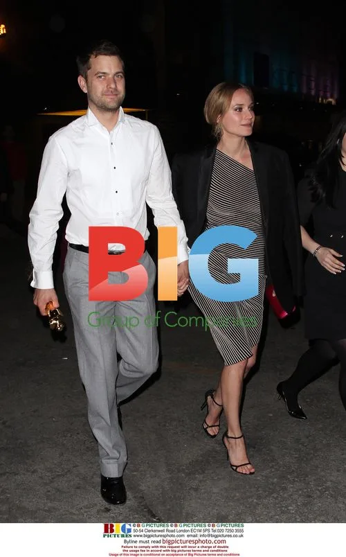 Joshua Jackson and Diane Kruger leaving awards