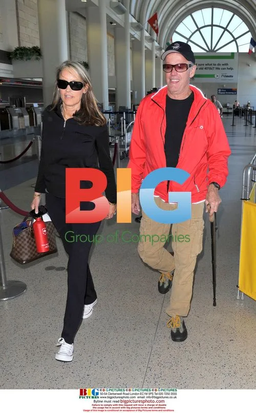 Peter Fonda with wife at LAX