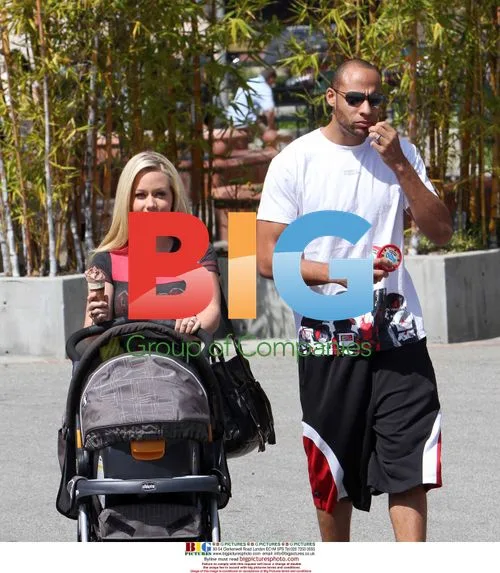 Kendra Wilkinson and Hank Baskett with son