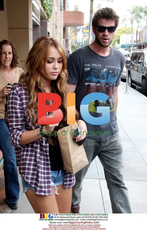 Miley Cyrus with Liam Hemsworth in LA