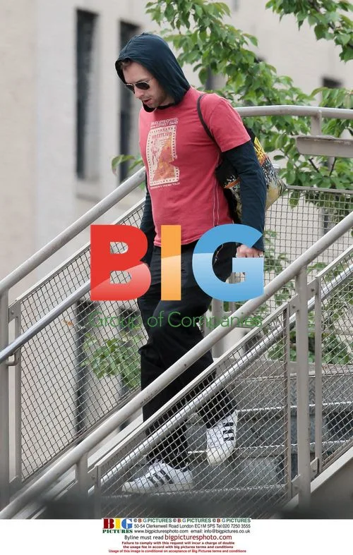 Chris Martin in NYC Wearing Bruce Springsteen Tee