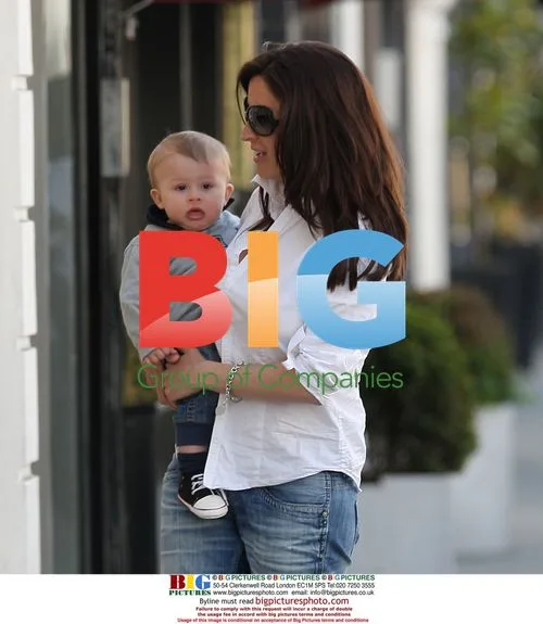 Rebecca Loos with son Magnus in London