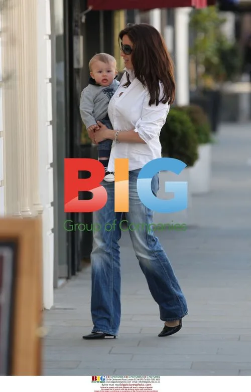 Rebecca Loos with son Magnus in London