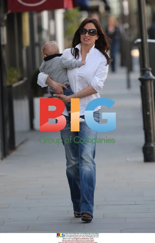 Rebecca Loos with son Magnus in London