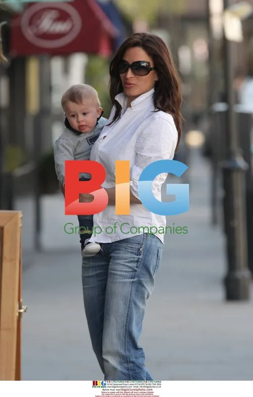 Rebecca Loos with son Magnus in London