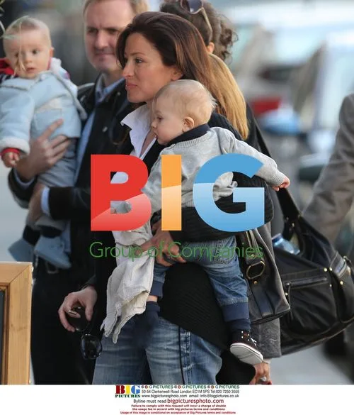 Rebecca Loos with son Magnus in London