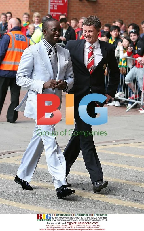 Dwight Yorke and Ole Gunnar Solskjaer Arrive at Old Trafford