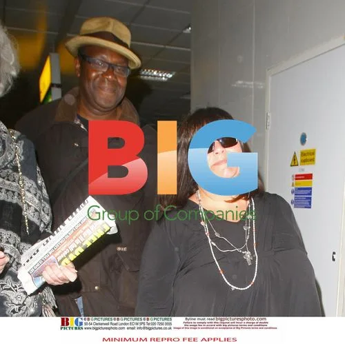 Lenny Henry and Dawn French Return Home from Caribbean