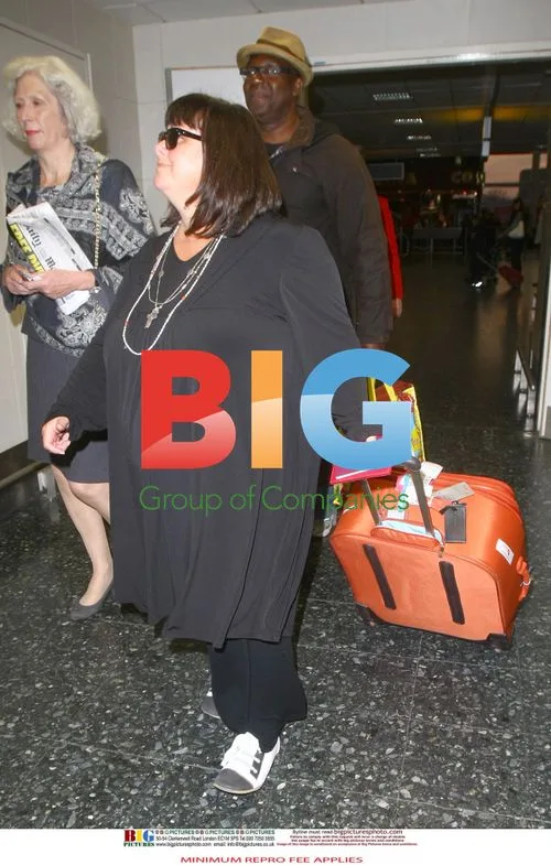 Lenny Henry and Dawn French Return from Caribbean