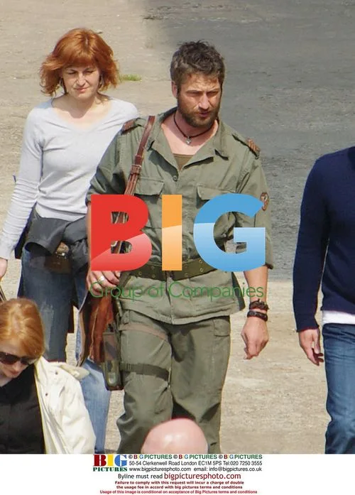 Director Ralph Fiennes and actors on "Coriolanus" set