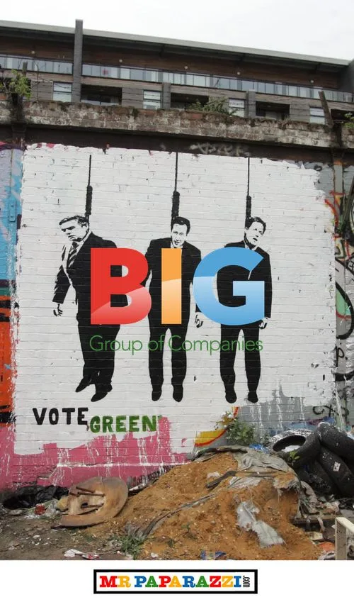 Politicians Debating Amid 'Vote Green' Graffiti