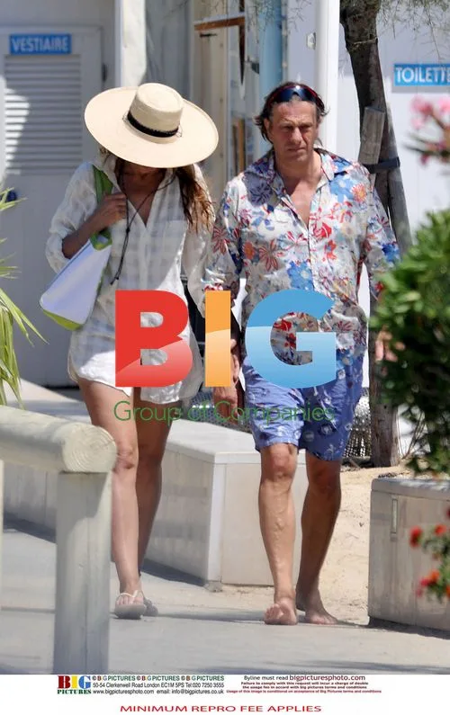 Jerry Hall Walks with New Boyfriend on Beach
