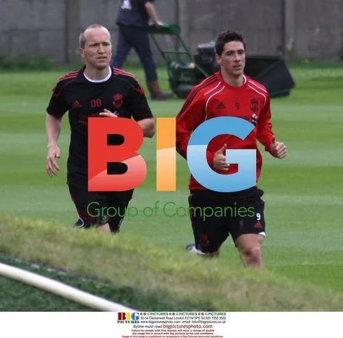 Torres and Kuyt Back in Training
