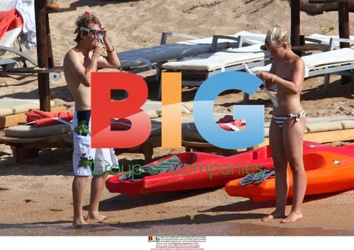 Sebastian Vettel takes holiday with girlfriend in Sardinia