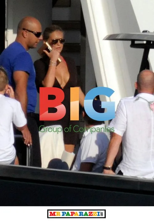 Celebrities Relaxing on Boat in Sardinia