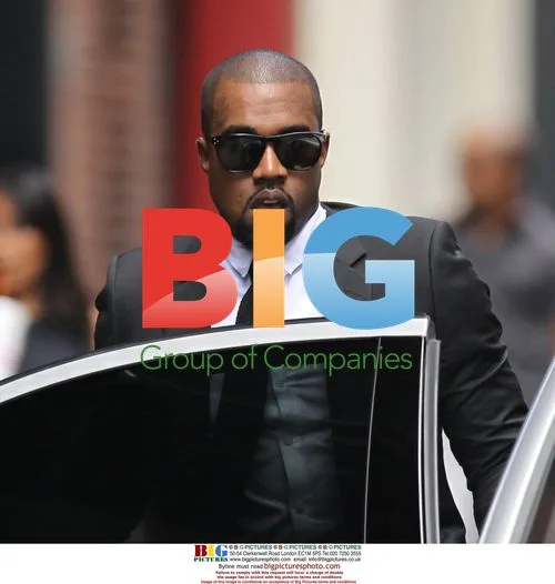 Kanye West in Suit Entering Maybach in NYC