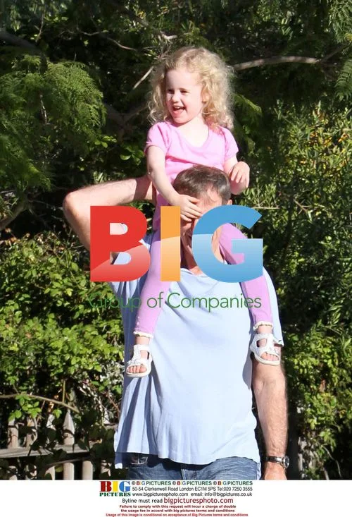 Marcia Cross' Twins Take a Walk with Dad