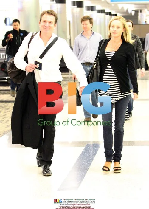 Mark McInnes and Lisa Kelly Arrive at LAX