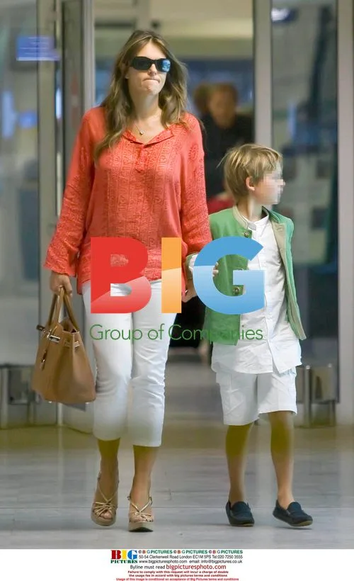 Liz Hurley and Family Arrive at Nice Airport