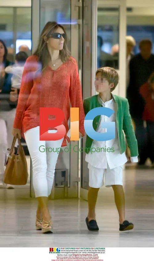 Liz Hurley arrives at Nice with son Damian