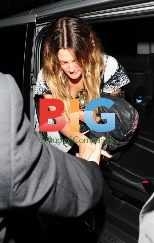 Drew Barrymore Leaving London Hotel