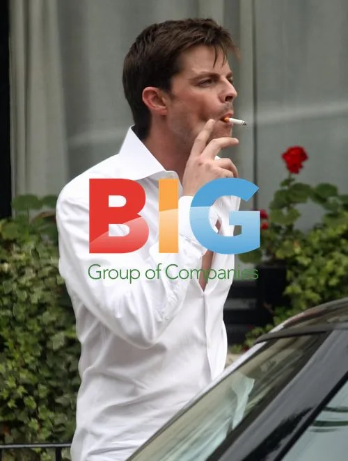 Brian Fortuna takes a smoke break in London