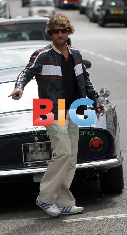 Jay Kay of Jamiroquai in Vintage Ferrari