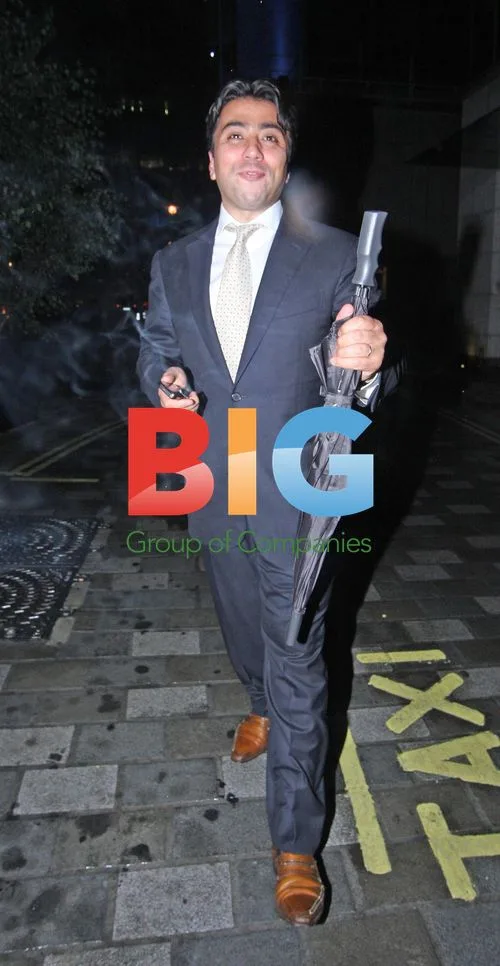 Kia Joorabchian Leaving Restaurant