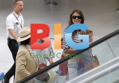 Liz Hurley Departs Airport with Family