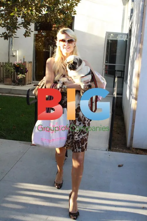 Paris Hilton with Pug Mugsy