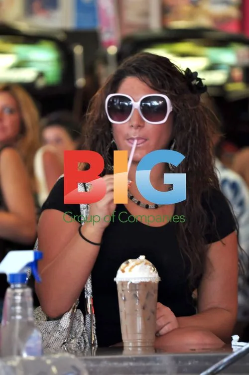Reality TV Star Deena Cortese Enjoys Iced Coffee