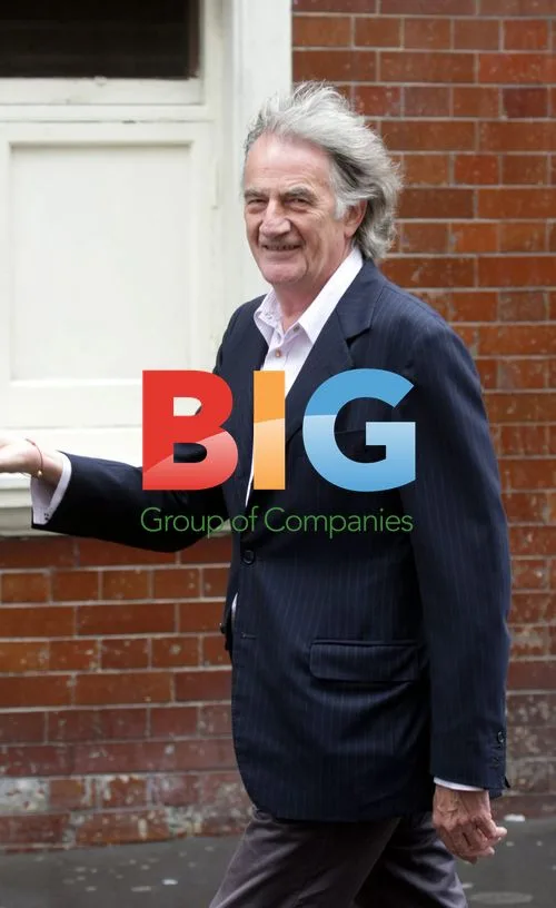 Paul Smith strolling in London rain