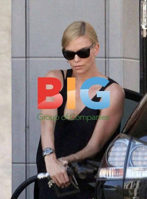 Charlize Theron Pumping Gas in LA