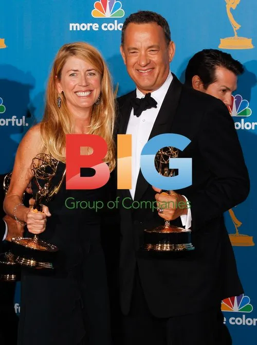 Tom Hanks Holds Emmy Award