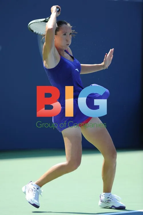 Jelena Jankovic returns volley at 2010 US Open