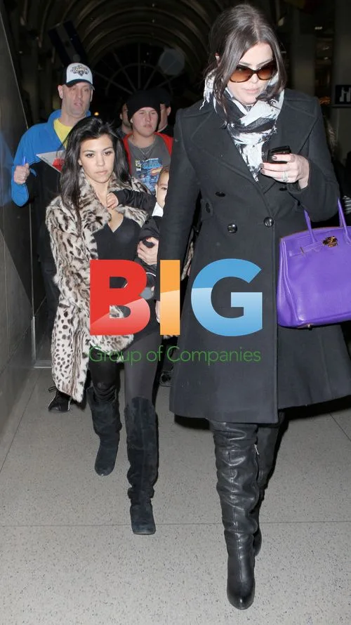 Kardashian Sisters Arrive at LAX