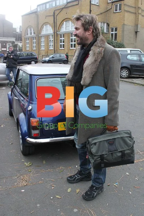 Simon Le Bon Struggles to Fit in Mini Cooper